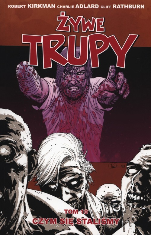 okładka Żywe trupy Tom 10 Czym się staliśmy książka | Robert Kirkman, Charlie Adlard