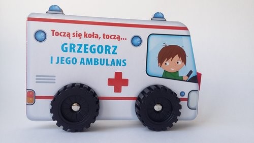 okładka Toczą się koła, toczą... Grzegorz i jego ambulans książka