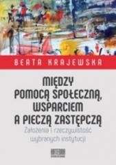 okładka Między pomocą społeczną, wsparciem a pieczą... książka | Beata Krajewska
